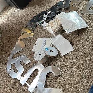 Wedding party supplies: just married sign, balloons, ribbon, adhesive